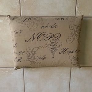 Decorator’s designer pillow.